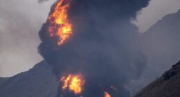 A huge fire is seen after an Iranian drone attack on a major oil facility in Fujairah, UAE on Saturday