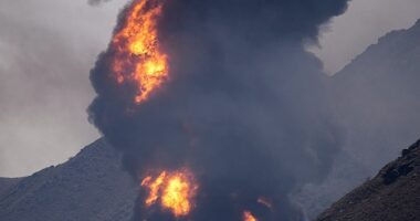 A huge fire is seen after an Iranian drone attack on a major oil facility in Fujairah, UAE on Saturday