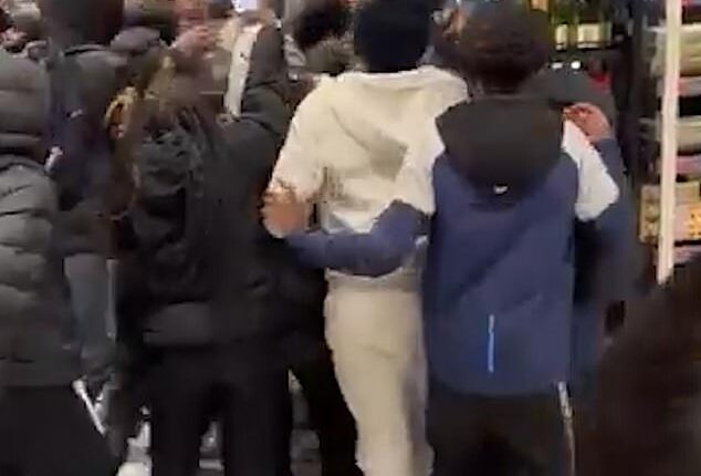 A mob of teenagers took over a Marks and Spencer food hall in south London on Saturday