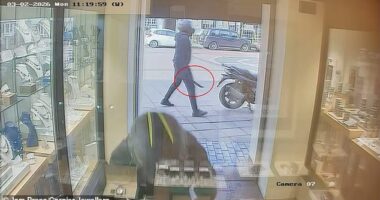 Dramatic footage shows two helmet-clad men pulling up outside the store on the High Street in Hoddesdon, Hertfordshire, on a motorbike at around 11:15am on Monday