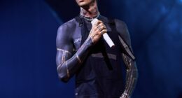 A Machine Gun Kelly fan suffered a mortifying moment after falling through a hole in the stage during the rapper's London concert on Thursday (seen above)