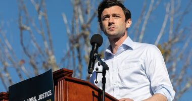 Jon Ossoff speaks to the crowd during an outdoor drive-in rally on December 5, 2020 in Conyers, Georgia