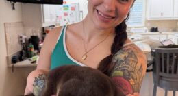 Hope Yates-MacDonald has trained in underwater recovery techniques and has even enlisted the help of a rescue otter named Splash to detect bones in the murky Florida creek