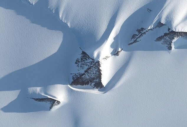 Independent researcher Jay Anderson spotted the ice-covered structures on Google Earth, showing three sharply angled Antarctic peak