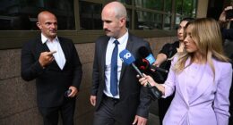 Thomas Sewell (centre) was heckled by a bystander as he left court earlier this year