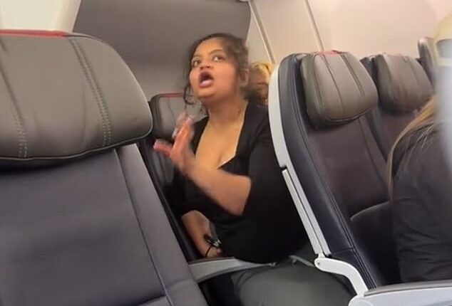 An American Airlines passenger had a complete meltdown after she was kicked off the plane for playing videos on her loudspeaker