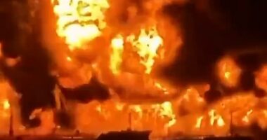 This is the moment Iraqi oil tankers erupt into flames after being struck by explosive-filled Iranian boats
