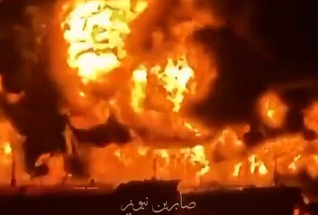 This is the moment Iraqi oil tankers erupt into flames after being struck by explosive-filled Iranian boats