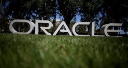 Oracle’s stock rises as company reportedly begins thousands of job cuts