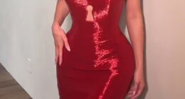 Kylie Jenner was every inch the Hollywood bombshell as she channeled Jessica Rabbit in a sultry, metallic red gown at the 98th Oscars this Sunday