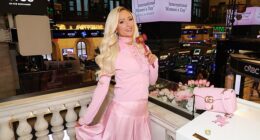 Paris Hilton turned heads in a pastel pink co-ord as she rang the New York Stock Exchange closing bell in honour of International Women's Day on Monday