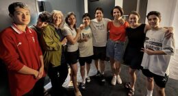 An undated photo released by Australia's Department of Home Affairs on March 11, 2026 shows six Iranian football players and a team official with two unidentified local officials (2nd and 3rd R) in Sydney, after they claimed asylum in Australia. One player did change her mind