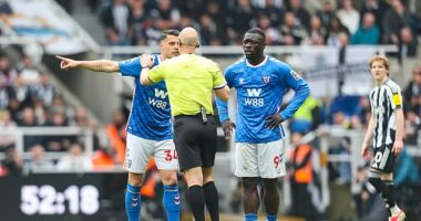 Sunderland's Granit Xhaka and Lutsharel Geertruida speak with the referee