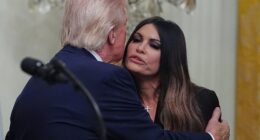 It was a family reunion of sorts in the East Room on Thursday as Donald Trump's almost daughter-in-law, US Ambassador to Greece Kimberly Guilfoyle, made a high-profile appearance at the White House to celebrate Greek Independence Day. The President ensured all eyes were on the envoy, giving her a glowing introduction and beckoning her to join him at the podium. 'Kimberly, Kimberly… that is my little pet name for her. I hope you come back here in, what is the term for that, 12 years?' Trump told the room, sparking laughter from a packed crowd. The 57-year-old Ambassador opted for understated elegance at the diplomatic reception, donning a simple, black dress, cinched at the waist with a delicate silver chain belt. To complete the look, she wore her signature classic diamond cross necklace.