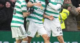 Yang feels the love from his Celtic team-mates after scoring twice against Motherwell