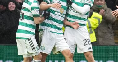 Yang feels the love from his Celtic team-mates after scoring twice against Motherwell