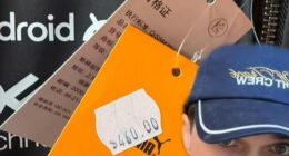 TikTok content creator MaybeMackenzie (pictured) has shown off the exorbitant prices seen at merchandise tents in Melbourne