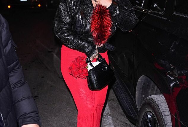 Rihanna, 38, was seen flying the coop on Monday after the shocking rifle attack on her Beverly Hills mansion; she's pictured on February 14 in NYC