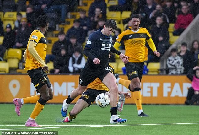 Mikey Moore was scythed down by Cammy Kerr... but Livingston ended up with a goal kick