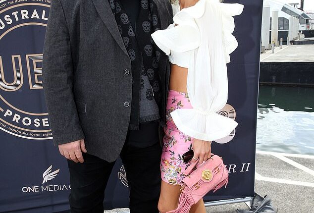 Kyle Sandilands might soon have a tidy sum in the bank after listing his Sydney property for sale. Pictured with wife Tegan Kynaston