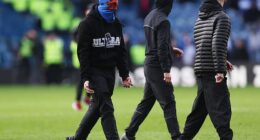 Ultras from both side of the Old Firm staged a pitch invasion after the Scottish Cup tie