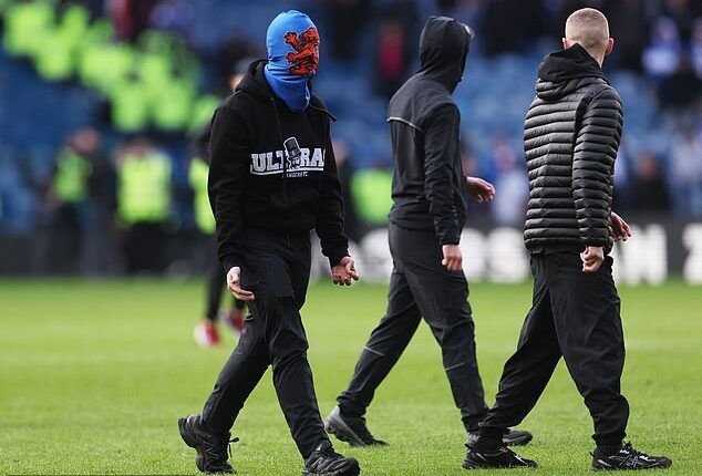 Ultras from both side of the Old Firm staged a pitch invasion after the Scottish Cup tie