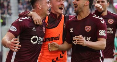Oisin McEntee celebrates after scoring Hearts' winner against Dundee