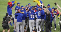 Venezuela's baseball team goes wild on the field after beating USA 3-2 in the WBC final