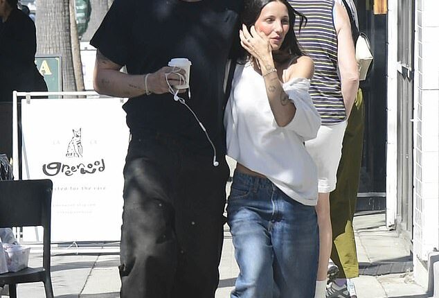 Cody Simpson (left) was spotted strolling arm-in-arm with American influencer Adelia Clark (right) outside a cafe in Los Angeles on Sunday, just two weeks after his split from Emma McKeon was confirmed