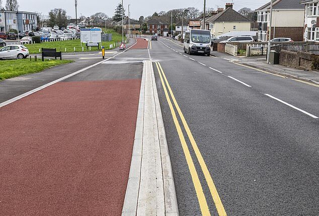 At over 11ft wide in places, the new bike lane actually exceeds the width of the neighboring 10ft-wide road, squeezing motor traffic into a narrower lane than the cyclists