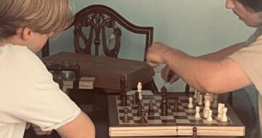 Angela Shellis was a doting mother who was happiest when she was at home with 'my boys' - her 18-year old son Tristan Roberts (right) and his brother Ethan, seen here playing chess