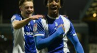 Oldham's Kane Drummond celebrates scoring his side's early goal against Notts County. The Latics ran out 3-0 winners and are flying towards the League Two play-offs
