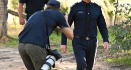 Chief Commissioner of Victoria Police Mike Bush departs after speaking to media at a press conference at the scene where fugitive Dezi Freeman was shot dead in Thologolong