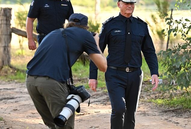 Chief Commissioner of Victoria Police Mike Bush departs after speaking to media at a press conference at the scene where fugitive Dezi Freeman was shot dead in Thologolong