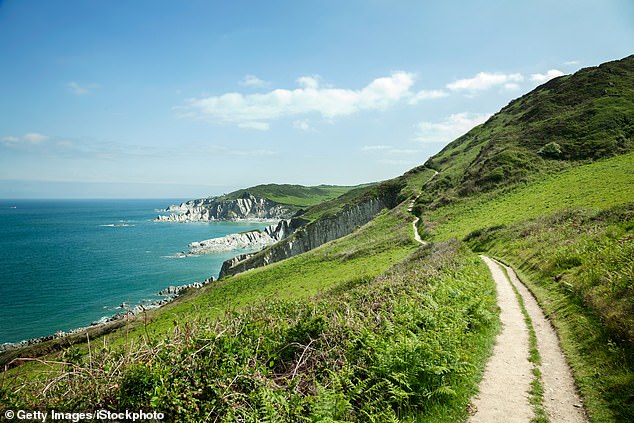 A new £28 million national trail will open next week after 18 years of construction (Pictured: South West Coastal Pathway, Mortehoe, Devon King Charles III Coastal Path)
