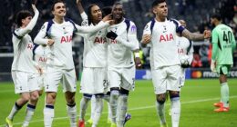 Tottenham's players celebrate their win in Frankfurt - but fans were making Nazi salutes