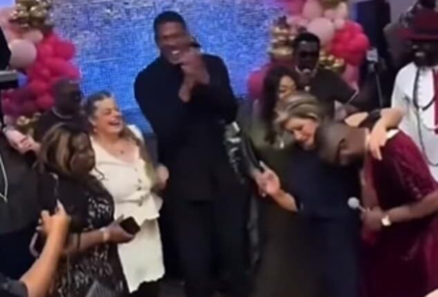 Anthony Joshua was seen dancing with the mothers of his two friends who were killed