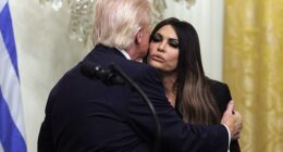 Donald Trump (L) greets US Ambassador to Greece Kimberly Guilfoyle during a Greek Independence Day celebration in the East Room of the White House in Washington, DC, USA, 26 March
