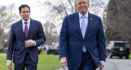 President Donald Trump (right) speaks with reporters outside the White House Friday alongside Secretary of State Marco Rubio (left). During the Q&A he said that the US doesn't 'use' the Strait of Hormuz