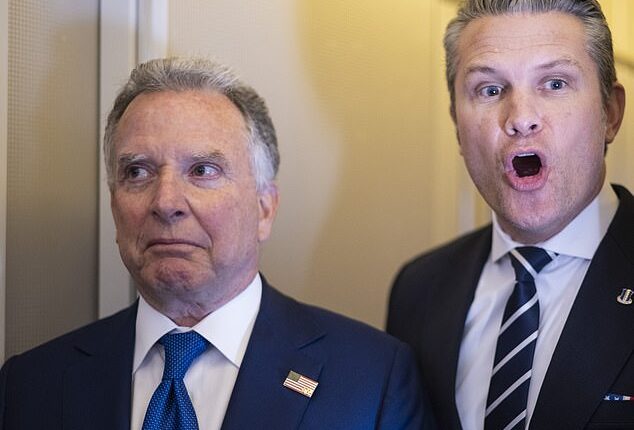 US Secretary of War Pete Hegseth (right) said 'we're certainly investigating' who was behind the attack, but agreed with Trump that it is something Iran might have done