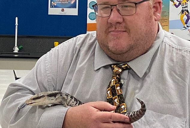 Jason Robert Morgan (pictured) was fired after school bosses discovered he had asked students a series of disturbing questions