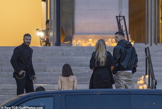 Victoria Beckham was supported by her husband David and children Romeo, Cruz and Harper at her Paris Fashion Week show on Friday