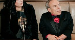 Warwick Davis and his mystery girlfriend were pictured together at last month's BAFTA Awards