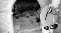Picture provided by the FBI shows a masked man at the home of Nancy Guthrie the night she went missing in Tucson, Ariz