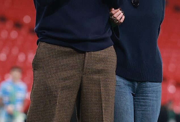 Manchester City's manager Pep Guardiola scooped the top spot in the fashion expert's rankings (seen with his daughter Maria last week)