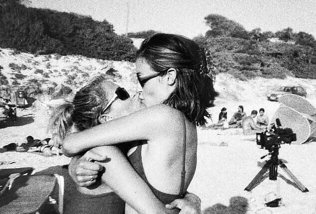 Celebrities like Cat Deeley enjoy platonic 'gal-pal kisses' with other women as a primal bonding ritual that flaunts the power of friendship 'in a world where car-crash romantic relationships tend to be common and very public', a body language expert has revealed