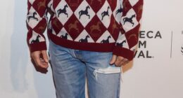 Jared Leto - known for his experimental fashion looks - pictured wearing distressed skinny jeans