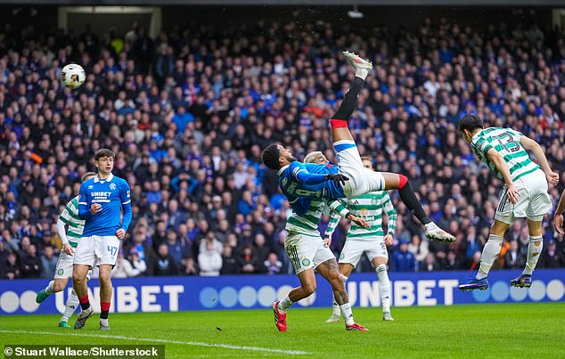 Youssef Chermiti (centre) scored a sublime overhead kick to give Rangers the lead vs Celtic