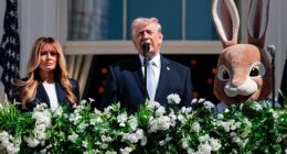 US President Donald Trump and First Lady Melania Trump address the crowd as they host the annual Easter Egg Roll on the South Lawn of the White House on April 6