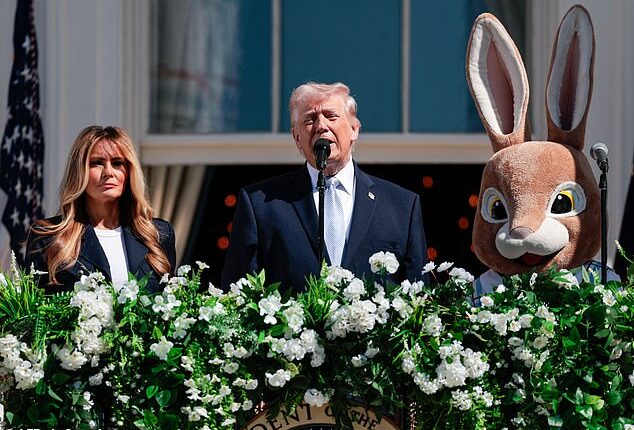 US President Donald Trump and First Lady Melania Trump address the crowd as they host the annual Easter Egg Roll on the South Lawn of the White House on April 6